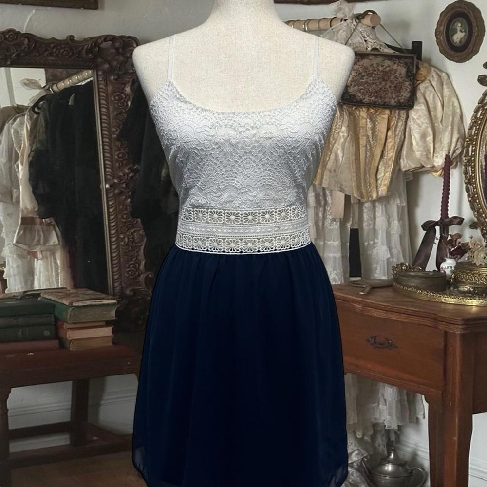 Stunning blue lace midi dress with a flowy skirt
